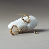 Pulsera y argollas en oro amarillo redondeado